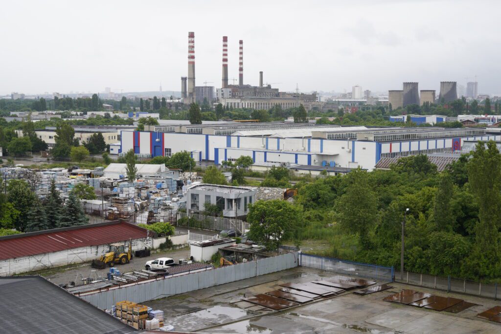 Industrial skyline with smokestacks and cooling towers