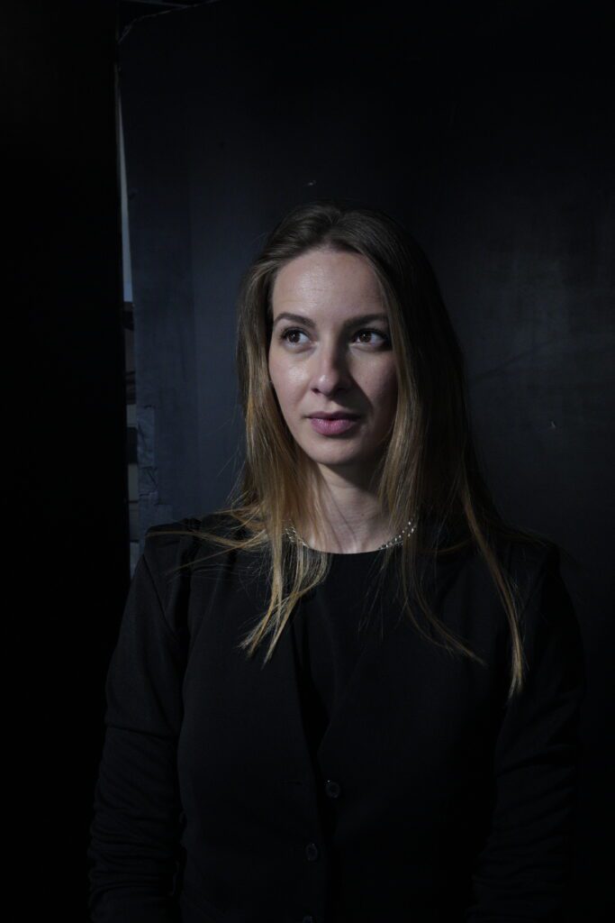 High-contrast portrait on dark backdrop