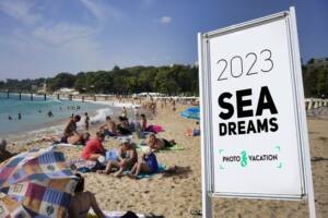 Sea Dreams photographic leporello — sequenced seaside frames as a folded book object