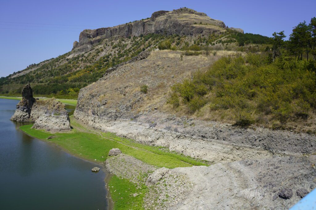 Rock pillars and plateau by the water