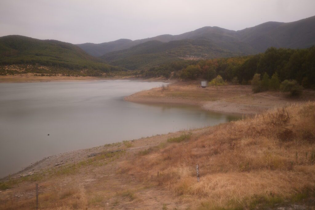 Hazy reservoir and dry bank