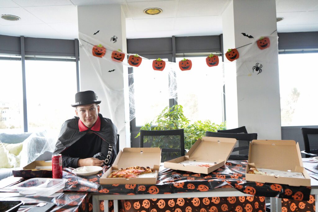 Costumed guest at Halloween pizza lunch