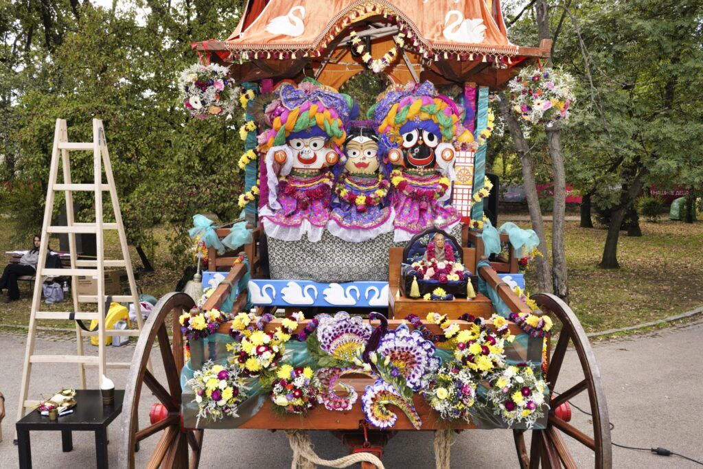 Flower-Adorned Ratha with the Three Deities